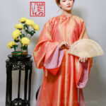 Thuê việt phục áo tấc cam san hô lót hồng Vstyle