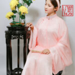 Thuê việt phục áo tấc xước kim hồng cam lót trắng vstyle